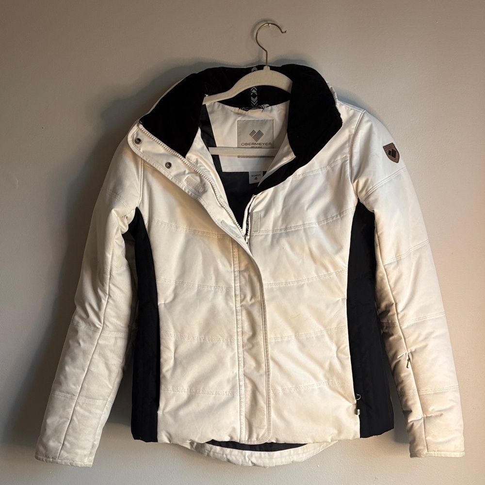 Obermeyer Women's Tuscany II Ski Jacket in white with black side panels.